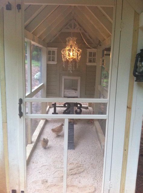 Chicken Coop with chandelier. I saw this on Tilly's Nest Facebook Page. If I ever have chickens, I want this! Fancy Chicken Coop, Chickens Coop, Cute Chicken Coops, Chicken Coup, Fancy Chickens, Coop Design, Chicken Coop Designs, Coop Plans, Building A Chicken Coop