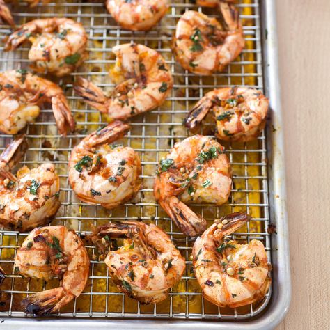 Brined Roasted Shrimp with Garlic, Parsley, and Anise. 1/4 cup salt in 1 qt water>brine for 15min then rinse and pat shrimp dry. Combine parsley, butter, oil, garlic, anise seeds, pepper flakes, and pepper >rub into shrimp and broil 4 inches from flame until shrimp is pink and c-shaped. For larger batches roast on rack like pictured. Brining gave the shrimp a great texture and loved the anise seed. Used shell-on, wild-caught, white Gulf shrimp, 16-20 size, cut and deveined before brining with th Broiled Shrimp, Best Chicken Ever, Roasted Shrimp, America's Test Kitchen Recipes, Herb Recipes, Weekend Meals, Shrimp Dishes, Cooks Illustrated, America's Test Kitchen