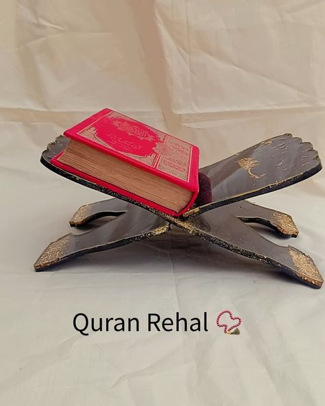 "Presenting our elegant handcrafted Quran Rehal, made with premium resin and adorned with golden details for a luxurious finish. Perfect for displaying the Quran with respect and style. 💛✨ A meaningful addition to your home or a thoughtful gift for loved ones. @resin_boutique__ DM us to place your order! 📩 #QuranRehal #ResinArt #HandcraftedWithLove #IslamicGifts #QuranStand #GiftIdeas" The Quran, Islamic Gifts, Resin Art, Thoughtful Gifts, Quran, First Love, Boutique, Gifts