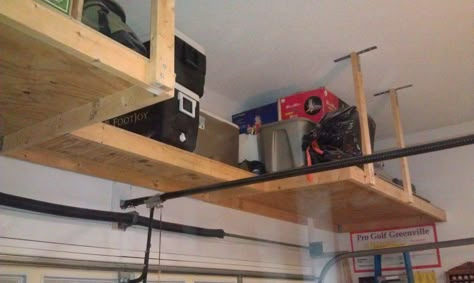 over garage door shelf | Above garage door storage Diy Cubbies, Garage Ceiling Storage, Garage Boden, Overhead Garage Storage, Overhead Garage Door, Garage Storage Shelves, Overhead Garage, Garage Storage Solutions, Garage Organization Diy