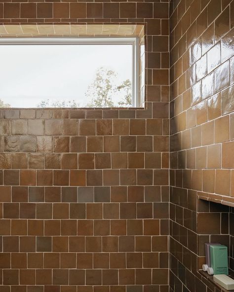 A thousand shades of ochre and umber – our Creosote 4x4 Cotto Allende, installed by @klhcustomhomes 📸 by @linea.photo Terra Cotta Tiles, Chinese Roof, Cotto Tile, Red Granite, Zia Tile, Marble Falls, Marble Showers, Brown Bathroom, Fired Earth