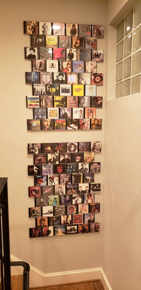 Cd Collage Wall Art, How To Hang Cds On A Wall, Music Memorabilia Display Ideas, How To Display Cds, Cd Decoration Ideas Wall Decor, Cds On Wall Ideas, Cd Shelf Ideas, Cd Collection Display, Cd Display Ideas