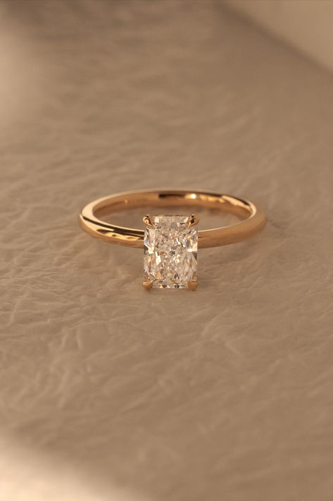 Dazzling in simplicity, this radiant solitaire engagement ring steals the spotlight with its hidden halo, adding the perfect touch of magic to the promise of forever 💍⁠ ⁠Ring Details:⁠ Liberty Radiant Solitaire⁠ Lab Grown Diamond⁠ 1.91ct | F | VS2⁠ 18k Rose Gold engagement ring ideas engagement rings simple engagement ring set engagement ring designs lab diamond engagement ring solitaire engagement ring rose gold rings rose gold ring engagement Simple Engagement Rings 2 Ct, Diamond Promise Rings Simple, Thing Gold Band Engagement Ring, Solitare Diamond Rings, Rings Engagement Timeless, Golden Band Engagement Rings, Simple Gold Ring Engagement, Basic Gold Engagement Ring, Gold Single Diamond Engagement Ring