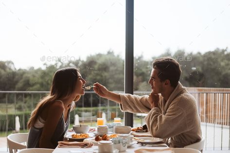 Couple eating breakfast together by TrendsetterImages. Romantic couple eating breakfast together at the hotel #Sponsored #breakfast, #eating, #Couple, #TrendsetterImages Breakfast Together Couple, Couple Making Breakfast, Couple Eating Together Aesthetic, Couples Eating Together, Romantic Morning Couple Breakfast, Couples Making Breakfast, Couple Eating Together, Couple Eating Breakfast, Couples Breakfast