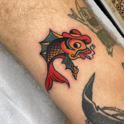 Super fun one for Kenneth! Thank you for choosing such a cool design! I have time available to tattoo you, always at @casatigretattoo @_casa_tigre_ #tattoo #tatuagem #oldschool #oldschooltattoo #traditional #traditionaltattoo #lisbon #lisbontattoo #lisboa #europe #europetattoo #fish #fishtattoo #cowboy Cowboy American Traditional Tattoo, Trad Fish Tattoo, Traditional Koi Fish Tattoo, Fish Traditional Tattoo, American Traditional Coy Fish, Koy Fish Traditional Tattoo, Traditional Fish Tattoo, Traditional Catfish Tattoo, Traditional Bass Fish Tattoo