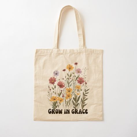 Get my art printed on awesome products. Support me at Redbubble #RBandME: https://www.redbubble.com/i/tote-bag/Grow-in-Grace-with-Wildflowers-Bible-Verse-Women-Christian-Gifts-Faith-Shirt-Religious-Wildflower-gift-Gift-for-her-by-Noemill/161700527.P1QBH?asc=u Diy Christian Tote Bag Painting Ideas, Christian Tote Bags Paint, Bible Tote Bag Painting Ideas, Tote Bag Painting Ideas Christian, Bible Bags Totes Diy, Bible Verse Women, Diy Tote Bag Painting Ideas, Tote Bag Painting Ideas, Bag Painting Ideas