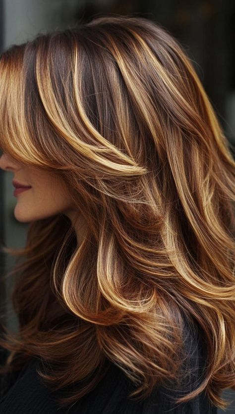 Discover 30 stunning fall hair colors, from rusty red to deep teal, perfect for adding warmth and style to your look this season. Medium Golden Brown Hair With Highlights, Fall Highlights For Brown Hair Caramel, Multicolor Highlights, Fall Highlights For Brown Hair, Heather Rae, Brown Hair Trends, Burgundy Highlights, Brown Hair With Caramel Highlights, Brown Copper