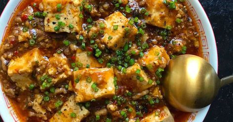 Mapo Tofu - This spicy braise, garnished with mouth-numbing Sichuan peppercorns, is one of the region's most well-known dishes. Sichuan Recipes, Fermented Black Beans, Mapo Tofu Recipe, Twice Cooked Pork, Black Bean Recipes, Mapo Tofu, Tofu Recipe, Tofu Dishes, Black Bean Sauce