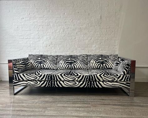 HiLo Brooklyn 🔆 Vintage Decor on Instagram: "Milo’s never looked so good! Milo Baughman iconic chrome sofa dressed in super luxurious faux zebra-hide. Available now! Come see her, and others in our Dumbo showroom. Link to my Etsy page in my bio. Thanks little birdie @ketiasuli HiLo specializes in custom vintage seating, let us build your dream vintage seating custom to you! Our services include: ➡️Design services to hone-in on your aesthetic and style ➡️Scouting and sourcing of your drea Zebra Print Sofa Living Room, Zebra Sofa, Zebra House Decor, Zebra Ottoman Living Rooms, Milo Baughman Chairs, Milo Baughman Sofa, Zebra Hide, Milo Baughman, Mid Century Living