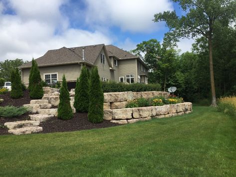 Limestone Boulder Retaining Walls | Twin Cities, MN — Stonewall Inc. Boulder Landscaping Zen Landscaping, Boulder Landscaping, Boulder Retaining Wall, Xeriscape Front Yard, Backyard Retaining Walls, Lime Stone, Landscaping On A Hill, Walkway Landscaping, Raised Patio