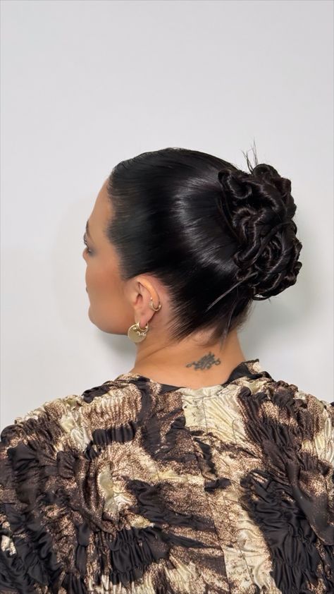 sleek hair, sleek bun, twisty bun, spiky bun, new york fashion week hairstyles, chignon, holiday hairstyles, party hairstyles, updo styles, updo for long hair, middle part bun, sleek middle part Middle Part Bun Sleek, Party Hairstyles Updo, Sleek Braided Bun, Long Hair Middle Part, Middle Part Bun, Fashion Week Hairstyles, Sleek Middle Part, Twisty Bun, Bun Sleek