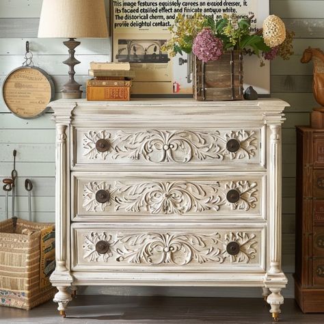 "Our exquisite carved dresser is a masterpiece of design, featuring detailed floral motifs and a distressed antique white finish. It's not just furniture; it's an heirloom that adds character and elegance to any room. 🕊️🌿 #ElegantInteriors #VintageChic" Carved Dresser, Chalkboard Paint, Cozy Bedding, Elegant Interiors, Wood Work, Cozy Bed, Floral Motifs, Antique White, Vintage Chic