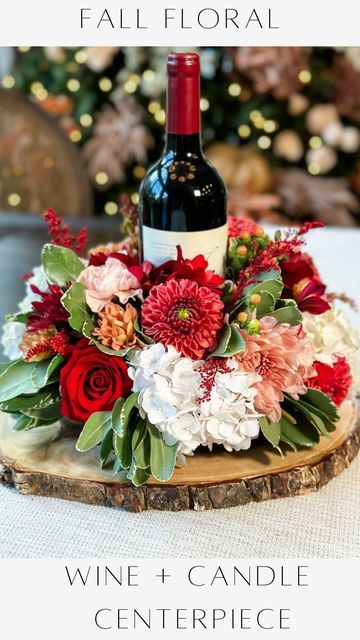 Wine Centerpiece, Janine Graff, Wine Bottle Flowers, Wine Candle, Fall Floral Centerpieces, Wine Bottle Centerpieces, Bottle Centerpieces, Candle Centerpiece, Wine Candles