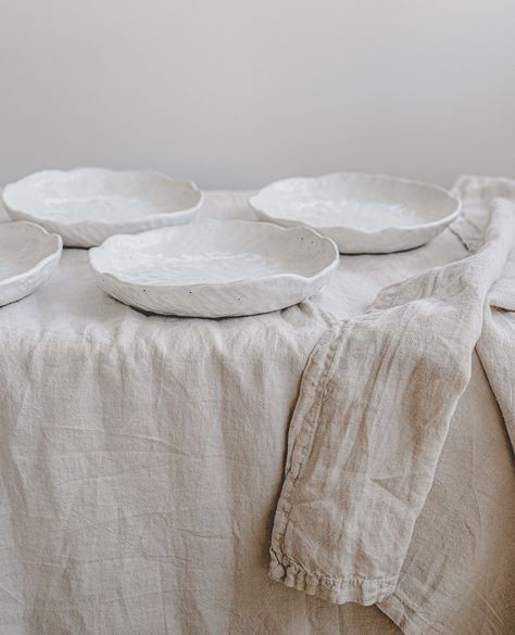 The perfect size and shape for a comforting bowl of pasta, these handmade bowls are hand formed from a flecked clay and finished in a white glaze that allows the natural speckles to show through.⁠ ⁠ ~ White Flecked Pasta Bowls⁠ ~ Stonewashed Flatware in Silver Handmade Bowls, Pasta Bowls, Handmade Bowl, White Glaze, The Natural, Flatware, Glaze, Pasta, Bowl