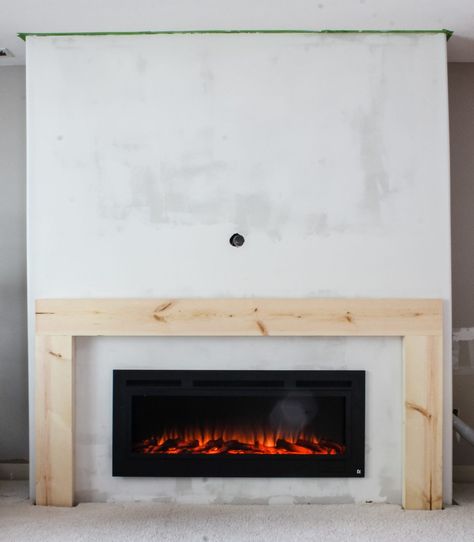 Flush Electric Fireplace Ideas, Built In For Electric Fireplace, Diy Portable Fireplace, Diy Drywall Fireplace, Simple Electric Fireplace Surround, Boxed In Fireplace, Organic Modern Electric Fireplace, Height Of Fireplace Mantel, Tiled Electric Fireplace Ideas