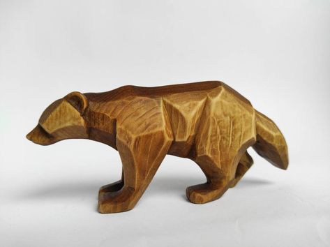 This wolverine has been carved out of basswood using only hand tools in order to get a simple, minimalist style. The piece is finished with boiled oak galls and beeswax. Oak Galls, Art Sculpture En Bois, Aspen Wood, Bear Sculptures, Bear Carving, Into The Wood, Wood Carving Designs, Carving Designs, Wood Carving Art