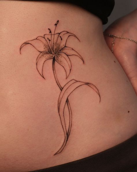 Lily for Jay 𖤣.𖥧.𖡼.⚘ Took 1 hour @inkpress.studio #lilytattoo#stargazerlily#lilytattoos#fineline#blackwork#floraltattoo#lineworktattoo#sftattoo#sftattooartist#bayareatattoo Orange Lily Tattoo, Tigerlily Tattoo, Tiger Lily Tattoo, Tiger Lily Tattoos, Tramp Stamp Tattoos, Branch Tattoo, Tramp Stamp, Lily Tattoo, Tiger Lily