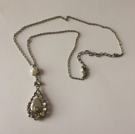 A beautiful floral crystal necklace. Circa: 1980's Condition: New vintage Markings: M&S Chain: 19 Inches Length of pendant: 2 ½ Inches Width of pendant: 0.8 Inches If you have any questions about this item please message me. Virtual Wishlist, Vintage Silver Necklace, Dream Accessories, Vintage Pendant Necklace, Silver Flower Necklace, Vintage Chain, Pink Teddy, Jewelry Lookbook, Fashion 2024