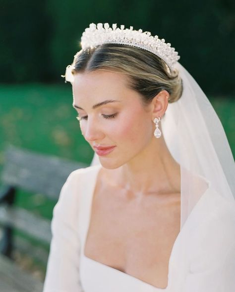 This stunning bride is channeling her royal wedding dreams, wearing our Gayle tiara in the enchanting setting of a historic castle in the Cotswolds. ✨ Seeing our Gayle tiara in such a magical moment, bringing timeless elegance and sophistication to a breathtaking venue, is truly a dream come true🤍 Workshop Hosts: Sophie Kaye (@SophieKayePhotography) & Poppy Carter (@PoppyCarterPortraits) Day of Coordinator: @TheWedding_Bee Venue: @Sudeleycastleweddings Hair and Makeup: @ByMadelineEleanor F... Diadem Wedding Hairstyle, Cartier Halo Tiara, Tiara Bridal Hair, Tiara Bride Hairstyles, Tiara Wedding Veil, Wedding Hair Tiara And Veil, Wedding Crown For Bride, Bridal Tiara Hair Down, Bridal Tiara Hairstyles