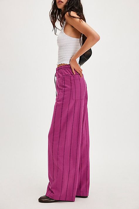 A textured take on our top-rated Hudson Canyon Pants, this slouchy pair is featured in a high-rise fit and wide-leg style with striped detailing and drawstring waistband. **Fit:** High-rise; wide, full-length legs **Features:** Textured fabrication with striped detail all over, adjustable drawstring waistband, pockets for hands, back-pocket detail **Why We ❤ It:** These billowy pants pair perfectly with your favorite tank and strappy sandals. | Hudson Canyon Textured Stripe Pants by Free People in Pink, Size: L Stripe Pants Outfit, Striped Lounge Pants, Statement Pants, Striped Pant, Stripe Pants, Fall Pants, People Clothes, Future Style, Boho Pants