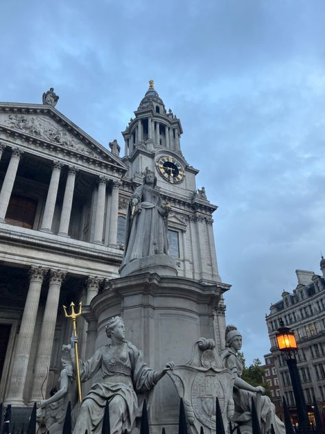 The entrance of Saint Paul’s Cathedral in London. This image of the Queen Anne statue. The sky is a lighblue and the sun is slowly beginning to set. There is a street lamp on. Saint Pauls Cathedral, St Pauls Cathedral London, St. Paul’s Cathedral, London Cathedral, St Pauls Cathedral, Saint Paul, London Uk, In London, London