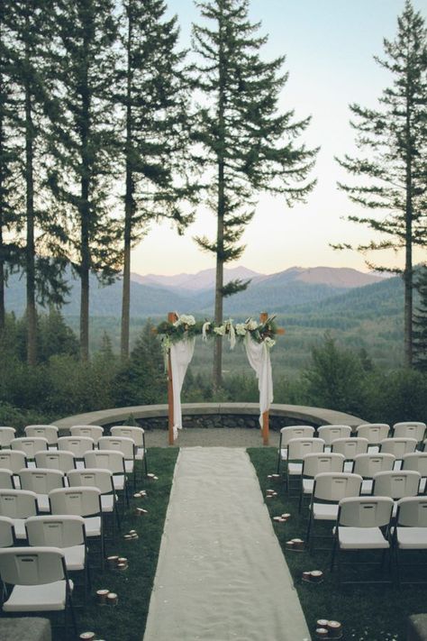 Romantic pacific northwest with pine trees and amazing mountain views white-curtained wedding arch | Image by From The Daisies #mountainwedding #ceremonyinspiration #lillyred #weddingdestinationphotographer May Wedding Groom Attire, Wedding Venues With A View, Washington Outdoor Wedding, Wedding Venue Oregon, Wedding Venues In Washington State, Washington Wedding Venues Outdoor, Whimsical Reception, Wedding Arch White, Oregon Wedding Venues