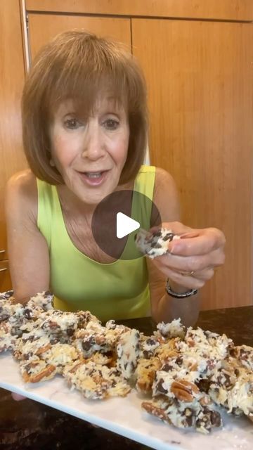 Rose Reisman on Instagram: "Hello Dollies, but in bark form! Recipes detail below, be sure to tag a fellow dessert lover in the comments! 😉  INGREDIENTS 1 cup semi sweet chocolate chips 2 cups chopped pecans 2 cups flaked coconut ½ can condensed milk (freeze remainder)  INSTRUCTIONS 1. Preheat oven to 350 F. Line a baking sheet with parchment paper. 2. Add all ingredients together and mix well. Spread thinly on tray and bake for 15 minutes. 3. Let cool then break into pieces. Keep refrigerated, enjoy! . . . #rosereisman #rosetip #cookbookauthor #chefathome #nutritionist #dessert #sweettooth #hellodollies #easyrecipe #sweetenedcondensedmilk" Peanut Snacks Recipes, Condensed Milk Candy, Hello Dolly Bars Recipe, Coconut Dessert Bars, Chocolate Bark Recipes, Bark Recipes Easy, Condensed Milk Recipes Desserts, Hello Dolly Bars, Flake Recipes