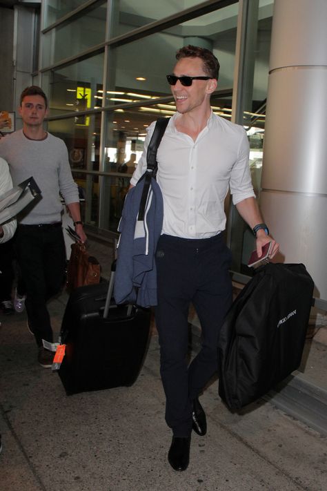 Tom Hiddleston, who has come to attend the Toronto International Film Festival, is seen signing autographs for fans after arriving at the Toronto airport, Canada on September 4, 2013 [HQ] Zawe Ashton, Imaginary Boyfriend, Long Flight, Perfect Smile, Jeremy Renner, Tom Hiddleston Loki, British Men, Tony Awards, British Actors