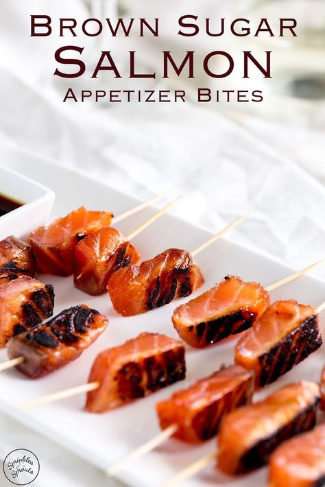 These cured brown sugar salmon skewers are a stunning yet simple appetizer idea. The gorgeous deep orange of the salmon contrasts to the black char, and then the flavour! You will be blown away with the sweet and salty salmon. This is decadent, delicious and dazzling party food!  Recipe by Sprinkles and Sprouts | Delicious food for Easy Entertaining Make Ahead Tapas, Brown Sugar Salmon, Salmon Skewers, Salmon Appetizer, Simple Appetizer, Fruit Kebabs, Party Snacks Easy, Orange Party, Appetizers Easy Finger Food