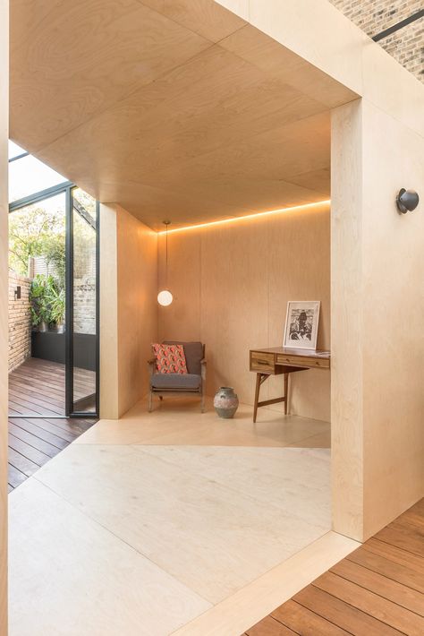 Yellow Cloud Studio adds distinctive triangular extension to London house Plywood Office, Plywood Interior, Yellow Cloud, Brick Interior, Light Hardwood, Prefab Cabins, Light Hardwood Floors, Backyard Office, London House