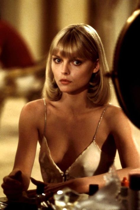 Elvira Hancock, <i> Scarface</i> Michelle Pfeiffer Scarface, Elvira Hancock, Female Movie Characters, Grease 2, Movie Character Costumes, Hair Evolution, Elvira Mistress Of The Dark, Tony Montana, Woman Movie