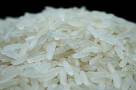 Grains of Perfection Close-up White Raw Rice Photo stock photos Photo Stock Images, Close Up, Black Backgrounds, Rice, Stock Images, Stock Photos