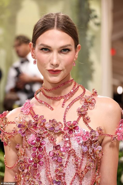 Karlie Kloss sparkles as she shows off her model figure in a pink crystal-embellished Swarovski gown at the 2024 Met Gala | Daily Mail Online Karlie Kloss Met Gala 2024, Karlie Kloss Met Gala, Pink Floral Gown, Italian Chic, Simple Classic Style, Lala Anthony, Sparkle In Pink, Met Gala Red Carpet, Floral Gown