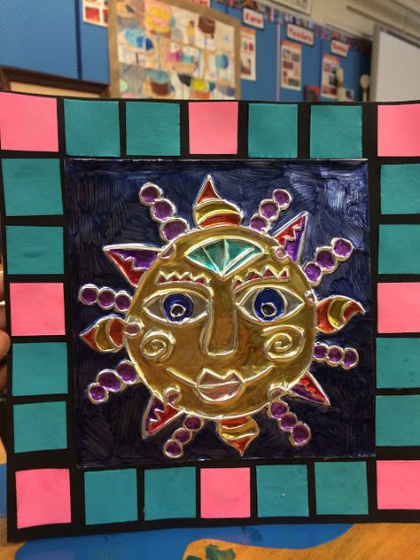 2nd Grade Aztec suns (foil relief, radial symmetry, pattern, mosaic) Mexican Sun Art Lesson, Aztec Sun Art, Mexican Sun Art, Aztec Crafts, Sun Patterns, Radial Symmetry, Aztec Sun, Hispanic Art, South American Art