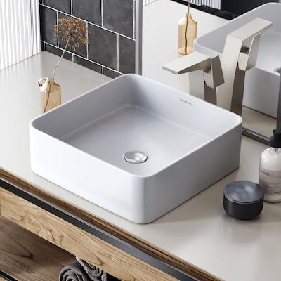 Shop Swiss Madison Concorde Glossy White Ceramic Vessel Square Modern Bathroom Sink (16.25-in x 16.25-in)undefined at Lowe's.com. Sleek and contemporary, the Concorde vessel sink features a fresh look for classic white ceramic, in true minimalist fashion. Striking simple style, while Organized Laundry Room, Square Bathroom Sink, Pedestal Sink Bathroom, Organized Laundry, White Vessel Sink, Cabinet Build, Modern White Bathroom, Rectangular Sink Bathroom, Ceramic Square