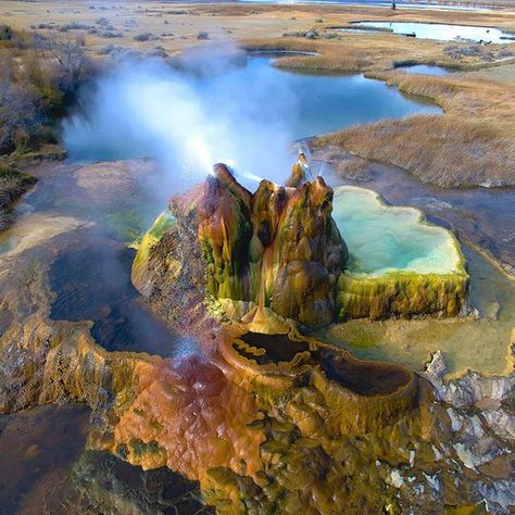 Fly Geyser aka Fly Ranch Geyser is a man made geothermal geyser located in Nevada. It is near the edge of Fly Reservoir and Hualapia Geothermal Flats and is now private property and trespasing is prohibited! . . The geyser was accidentally created during Fly Geyser Nevada, Fly Geyser, The Burning Man, The Burning, Diy Planters, Beautiful Places To Travel, Magical Places, Burning Man, America Travel