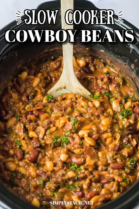 Image of slow cooker cowboy beans in a slow cooker with a wooden spoon. Slow And Easy Cowboy Perfection, Best Ever Cowboy Beans, Crockpot Recipes With Beans, West Bend Slow Cooker Recipes, Pot Of Beans Slow Cooker, Cowboy Beans Crockpot, Slow Cooker Cowboy Beans, Crock Pot Beans, Crockpot Beans