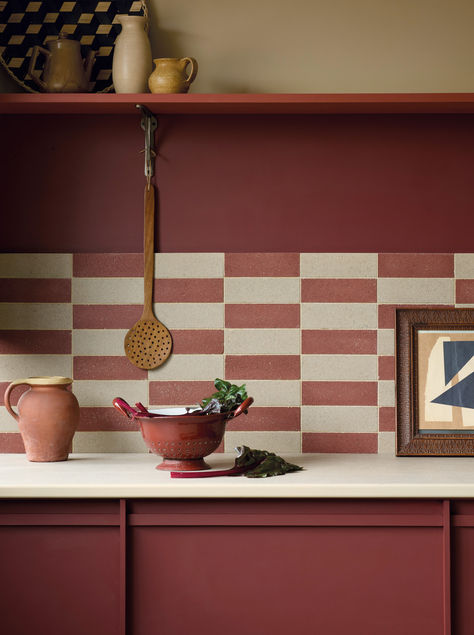 Our Oxblood paint is a deep earthy red with a brown undertone which pairs beautifully with Fresco Red and Stonebrook colours. Our Formella composite tiles in Plum and Natural are shown on the wall. Oxblood Paint, Painted Shelf, Recycled Tile, Eco Friendly Paint, Natural Pigments, Shades Of Burgundy, Paint Colour, Warm Red, Paint Colours