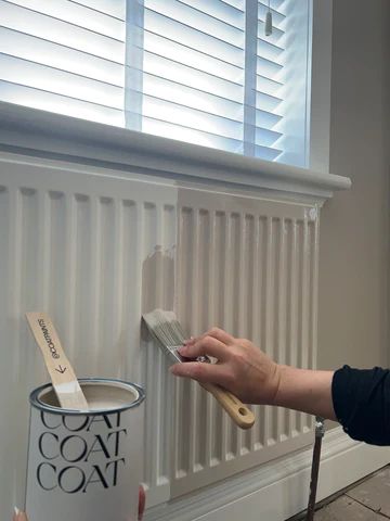 How To Paint Radiators – COAT Paints Radiator On Panelled Wall, How To Make Radiators Look Nice, Paint Radiator Same Colour As Wall, Radiator Same Colour As Wall, Painted Heater Radiator, Painted Radiator Same As Wall, Radiator Painted Same Colour As Wall, Paint Colours 2023 Uk, Black Radiator Paint