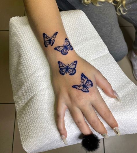 Tattoo Papillon, Blue Ink Tattoos, Maching Tattoos, Butterfly Tattoos On Arm, Purple Tattoos, Butterfly Hand Tattoo, Butterfly Wrist Tattoo, Phrase Tattoos, Knuckle Tattoos