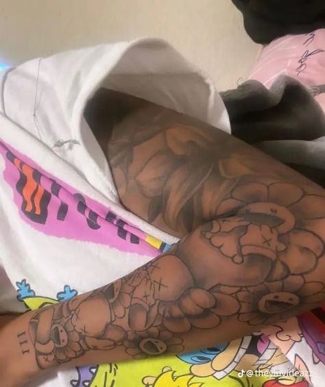 Tattoo Ideas Female Brown Skin, Kaws Tattoo Ideas For Women, Kaws Sleeve Tattoo, Tattoos Black Women Arm, Should Tattoos For Women, Tattoo Ideas Black Men, Sleeve Tattoos With Meaning, Sleeve Tattoos Black Women, Tattoo Essential