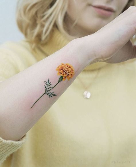 Yellow Flower Tattoos, Marigold Flower Tattoo, Yellow Tattoo, Marigold Tattoo, Carnation Tattoo, Flower Tattoo Meanings, Flower Wrist Tattoos, Muster Tattoos, Small Flower Tattoos