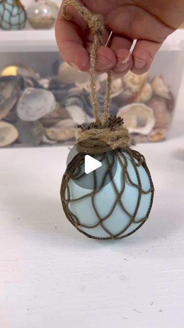 Emily Seilhamer on Instagram: "EASY nautical themed ornament!🎨🐚 #diyideas #easycrafts #artsandcrafts #beachvibes #tutorials" Nautical Christmas Decor Diy, Diy Ocean Ornaments, Nautical Ornaments Diy, Diy Nautical Christmas Ornaments, Beach Theme Christmas Tree Ideas, Shell Ornaments Diy, Seashell Ornaments Diy, Ocean Christmas, Diy Lighthouse