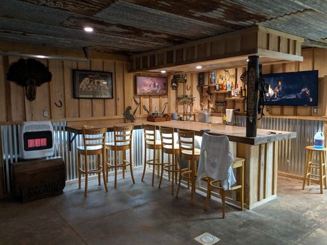 Man cave, bar, hangout, shop Garage Bar Lighting, Rustic Man Cave Bar, Shop Hangout Ideas, Shop With Man Cave, Mancave Walls, Pole Barn Bar, Shop Man Cave Ideas, Man Cave Pole Barn, Pole Barn Man Cave