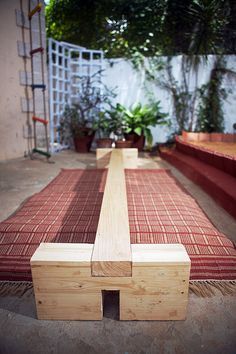 DIY balance beam - like the rug underneath instead of fabric and foam all over the beam. Diy Balance Beam, Backyard Kids Play Area, American Ninja Warrior, Diy Playground, Balance Beam, Play Spaces, Outdoor Classroom, Backyard Playground, Backyard Play