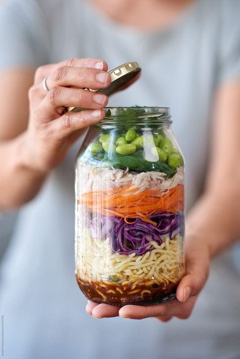 Hands Holding Glass Jar Filled With Fresh Colourful Vegetables | Stocksy United Salad Jar Photography, Glass Jar Photography, Jar Photoshoot, Mason Jar Salad Layers, Healthy Office Lunch, Healthy Takeaway, Styling Moodboard, Jar Photography, Sweet And Spicy Shrimp