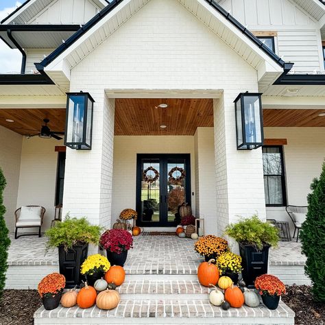 When we left for Florida on Saturday, the temperature was still in the 90’s! I’m ready to get back and decorate the front porch but am hoping the temps drop a little. Loved this from last fall…pumpkins and mums are my favorite way to decorate for fall. 🍁🍂 What do you use most for fall decoration? Real or fake pumpkins? And I’ve seen lots of people use fake mums! What do you think? #fall #falldecor #falldecorations #falldecoratingideas #fallporch #fallporchdecor #fallcolors🍁🍂 #pumpkinseason ... Porch Styling, Decorate For Fall, Fake Pumpkins, Fall Front Porch Decor, Front Porch Decor, Fall Front Porch, Fall Decoration, Fall Decorations Porch, Fall Front