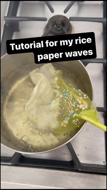 Anita Wright on Instagram: "You asked for a tutorial on how I did these fun waves so here you go. Please feel free to message me if you have any questions. . . . . #seaweed #waves #ocean #underthesea #mermaid #cakeartist #cakes #tutorial #cakesofinsta #cakestyle #cakedecorating #springroll #springrollwrappers #cakedesigner #cakeartistry #cakedecoratingclasses #learnhow #caketopper #caketopperideas #easypeasy #tryit" Rice Paper Waves Cake, How To Make Waves On A Cake, River Cake, Ocean Cake Ideas, Ocean Cake, Ocean Birthday Cakes, Wave Cake, Sugar Glass, Spring Roll Wrappers