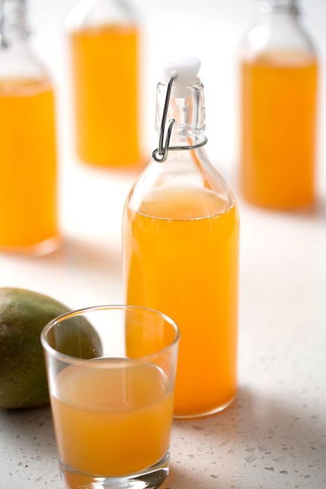 This Mango Kombucha recipe has just the right amount of sweetness to pair with the drink\'s natural tang. This recipe is allergy friendly (gluten, dairy, shellfish, nut, egg, and soy free) and suits the autoimmune protocol diet (AIP), and Paleo diets. Mango Kombucha, Kefir Water, Paleo Smoothies, Autoimmune Protocol Diet, Healthy Beverages, Mango Tea, Kombucha Recipe, Homemade Kombucha, Soy Free Recipes