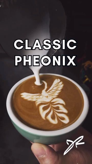 Here is some amazing latte art as we see the Phoenix created in a latte. This barista pours an oincredible piece of art. #latteart #latteartvideo Video credit: IG @joostrolland Latte Art Video, Latte Art Tutorial, Coffee Latte Art, Coffee Cup Design, Art Competitions, Pouring Art, Piece Of Art, Coffee Latte, Latte Art